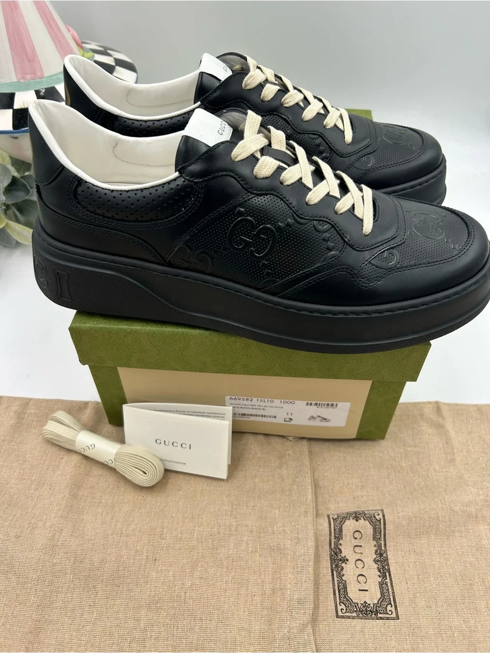 Men's Gucci, GG embossed leather sneakers size 11 fits 11.5 US made in Italy
